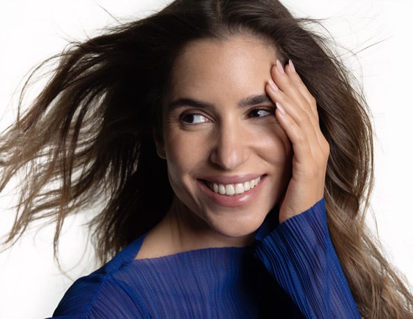 Smiling woman with flowing hair